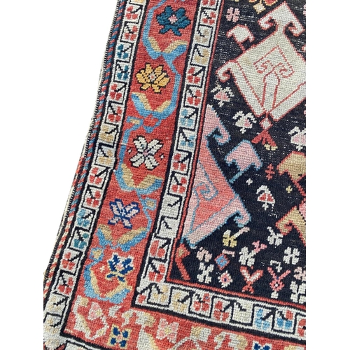 115 - ANTIQUE CAUCASIAN KAZAK RUG, 240cm x 115cm.