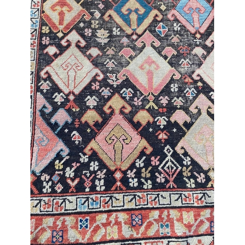 115 - ANTIQUE CAUCASIAN KAZAK RUG, 240cm x 115cm.