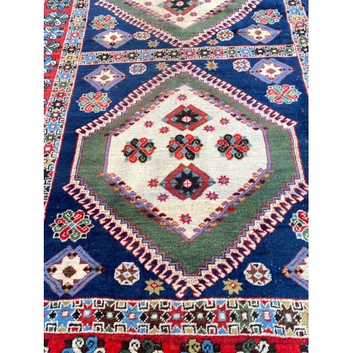 119 - ANTIQUE SOUTH WEST PERSIAN QASHQAI CARPET, 300cm x 201cm.