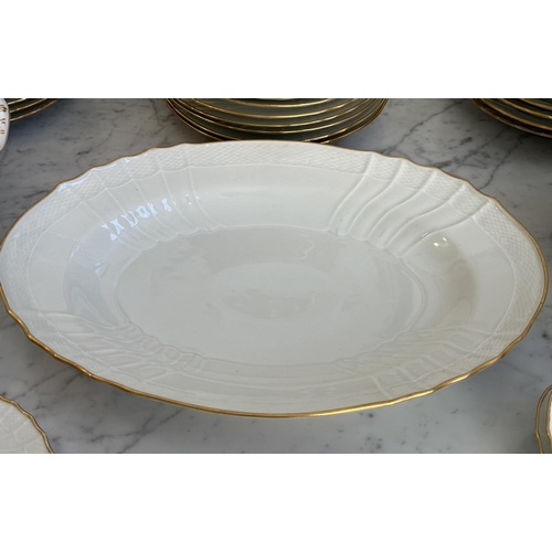 143 - GINORI DINNER SERVICE, Richard Ginori, Italy, an extensive service gold/white, including sixteen din... 