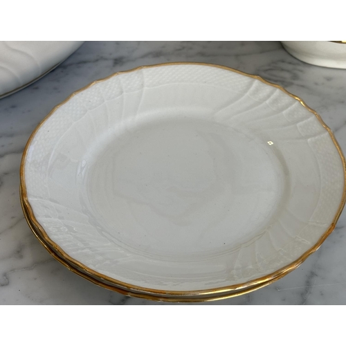 143 - GINORI DINNER SERVICE, Richard Ginori, Italy, an extensive service gold/white, including sixteen din... 