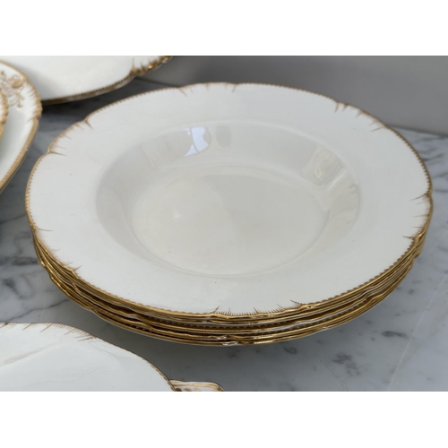 144 - MAPLE & CO LONDON PARIS DINNERWARE, Italian retailed by Maple & Co, white porcelain and gold includi... 