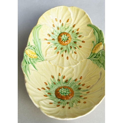 148 - MAJOLICA AND CARLTON WARE, a collection including English Portuguese and Spanish cabbage ware togeth... 