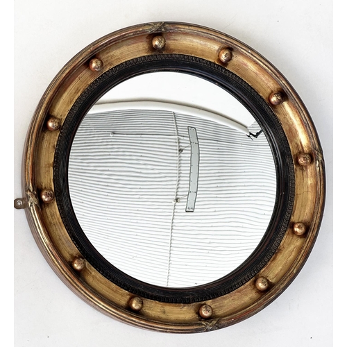 150 - WALL MIRROR, Regency style giltwood and gesso circular bevelled with ball encrusted frame and ebonis... 