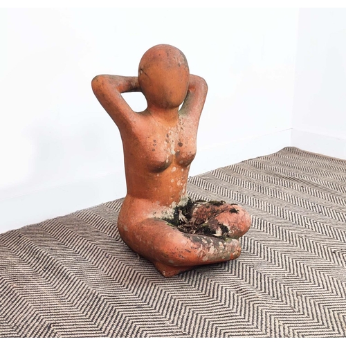 164 - GARDEN SCULPTURE, terracotta in the form of a seated figure, 64cm H x 40cm x 37cm. (weathered)