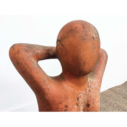 164 - GARDEN SCULPTURE, terracotta in the form of a seated figure, 64cm H x 40cm x 37cm. (weathered)