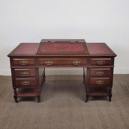 166 - PEDESTAL DESK, Victorian mahogany, circa 1890 with red leather slope and six drawers on brass castor... 