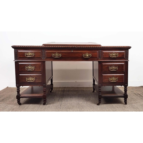 166 - PEDESTAL DESK, Victorian mahogany, circa 1890 with red leather slope and six drawers on brass castor... 