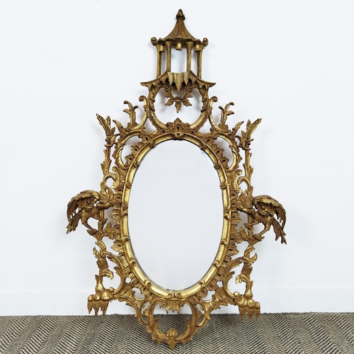 168 - WALL MIRROR, Chinese Chippendale style giltwood with oval plate and pagoda crest, 137cm H x 87cm.