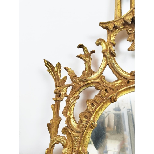 168 - WALL MIRROR, Chinese Chippendale style giltwood with oval plate and pagoda crest, 137cm H x 87cm.