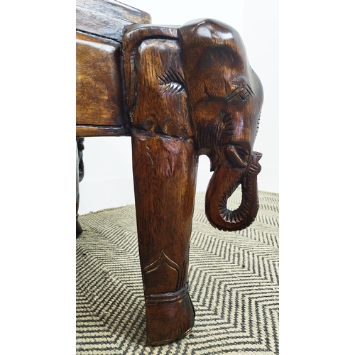 171 - LOW TABLE, rectangular hardwood on carved elephant supports, 43cm H x 119cm x 70cm.