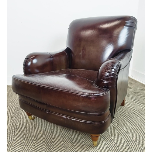 175 - HOWARD STYLE ARMCHAIR, dark brown leather with brass front castors, 89cm H x 80cm W x 105cm D.