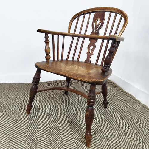 180 - WINDSOR ARMCHAIR, Victorian ash and elm, 91cm H x 53cm W x 58cm D.