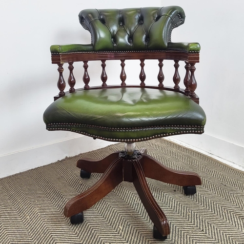 185 - DESK CHAIR, green leather with swivel seat on castors, 88cm H x 62cm.