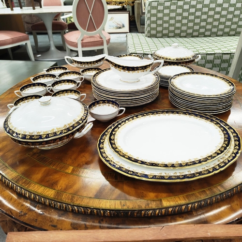 19 - DINNER SERVICE, Royal Worcester, 'Arundel', comprising eleven dinner plates, eleven salad plates, te... 