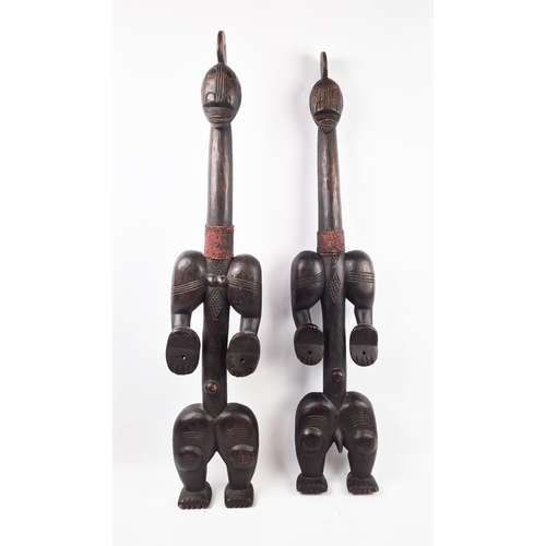 8 - BAOULÉ TRIBAL FIGURES, a pair, Ivory Coast, carved hardwood and beadwork, 100cm H. (2)