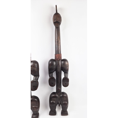 8 - BAOULÉ TRIBAL FIGURES, a pair, Ivory Coast, carved hardwood and beadwork, 100cm H. (2)