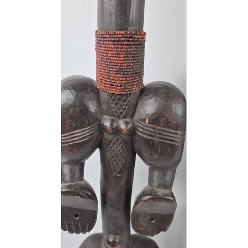 8 - BAOULÉ TRIBAL FIGURES, a pair, Ivory Coast, carved hardwood and beadwork, 100cm H. (2)