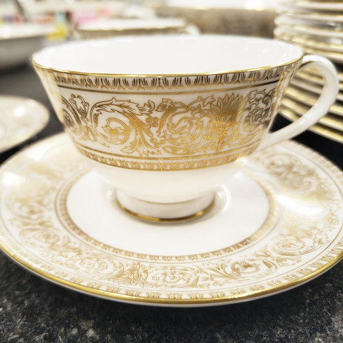 9 - ROYAL DOULTON DINNER SERVICE, comprising twelve dinner plates, eleven tea cups and saucers, twelve s... 