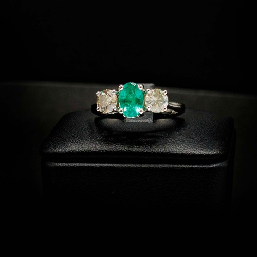 51 - CERTIFICATED 18CT WHITE GOLD EMERALD AND DIAMOND TRILOGY RING, emerald 0.66ct, diamonds 0.37ct, Cert... 