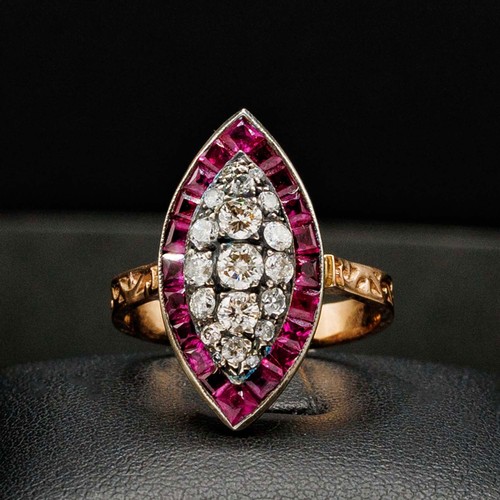 59 - UNHALLMARKED ROSE GOLD NAVETTE RING SET, with RBC diamonds and calibre cut spinel with scroll patter... 