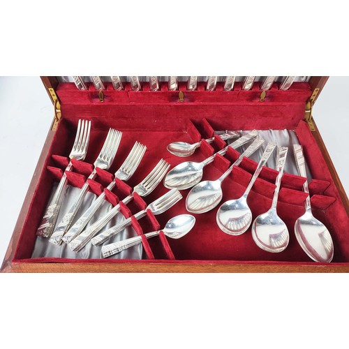 28 - AN ART DECO VINERS OF SHEFFIELD CASED CANTEEN OF CUTLERY, circa 1930, silver plated cutlery in the R... 