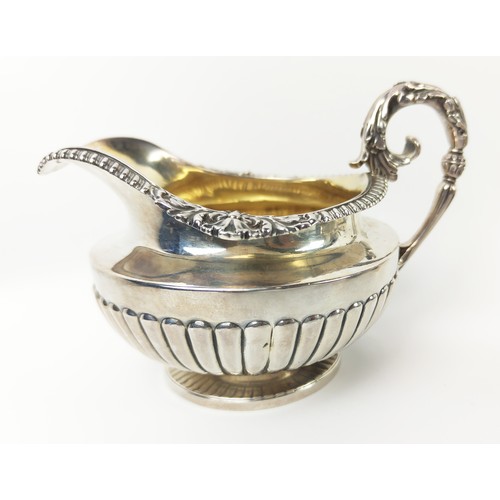 38 - A COLLECTION OF SILVERWARE, comprising a George IV milk jug, London 1824, a hip flask, christening c... 