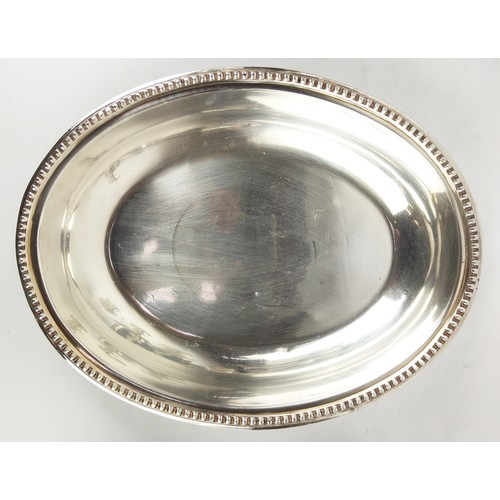 39 - A LARGE QUANTITY OF ASSORTED SILVER PLATED WARES, including trays, candlesticks, tea sets, decanter ... 