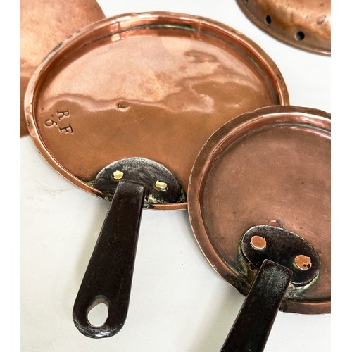 105 - EARLY COPPERWARE/KITCHENWARE, a 19th century brass preserving pan, three saucepans and six lids and ... 