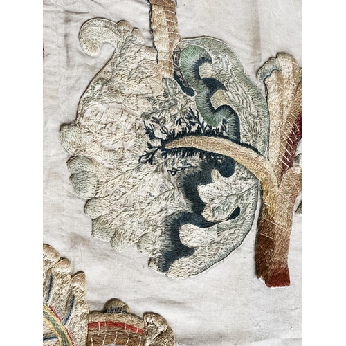 109 - WALL HANGING, 19th century canvas and lined incorporating deeply embroidered floral and foliated mot... 