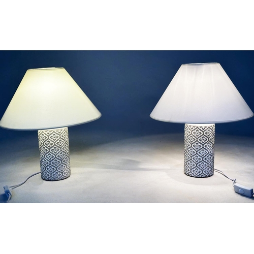 117 - TABLE LAMPS, a pair, geometric  moulded with shades, 40cm H. (2)