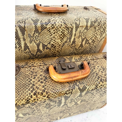 118 - SUITCASES AEROPACK BY MCBRINE, two U.S. 1950s faux snakeskin, 54cm x 42cm and 46cm x 32cm. (2)