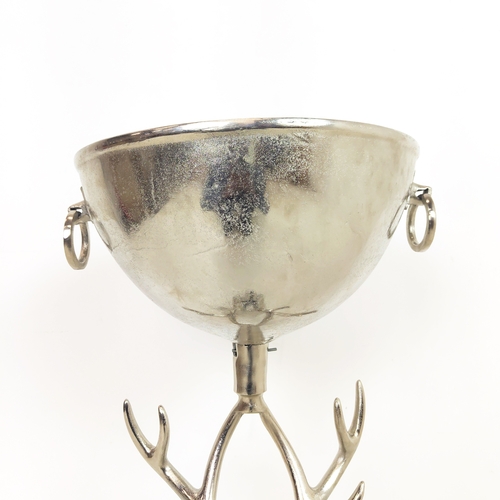 440 - CHAMPAGNE BATH, on stag head form stand, polished metal, 91cm H approx.