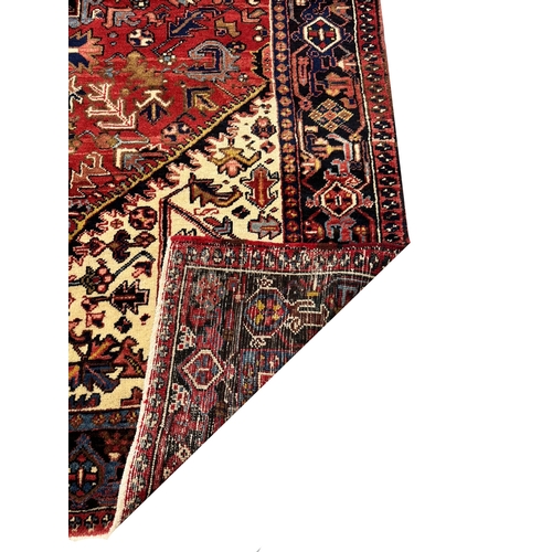 73 - FINE PERSIAN HERIZ CARPET, 345cm x 248cm.