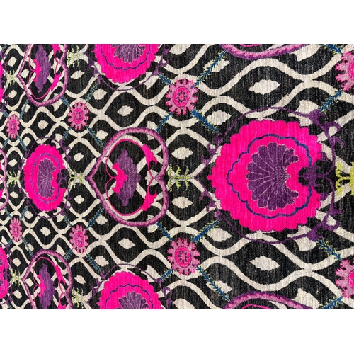 82 - CONTEMPORARY 'FUSCHIA LILYPAD' CARPET, 305cm x 245cm, handwoven wool.