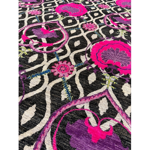 82 - CONTEMPORARY 'FUSCHIA LILYPAD' CARPET, 305cm x 245cm, handwoven wool.