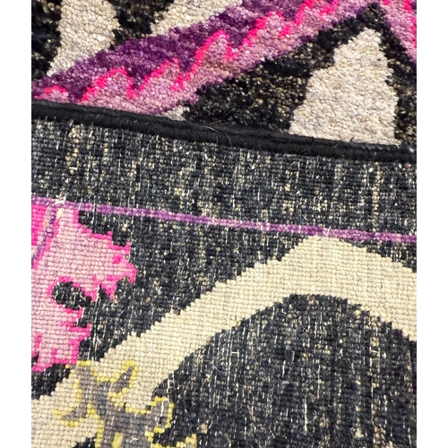 82 - CONTEMPORARY 'FUSCHIA LILYPAD' CARPET, 305cm x 245cm, handwoven wool.