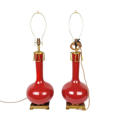 450 - TABLE LAMPS, a near pair, red glazed ceramic and gilt metal, 59cm H at tallest not including shade c... 