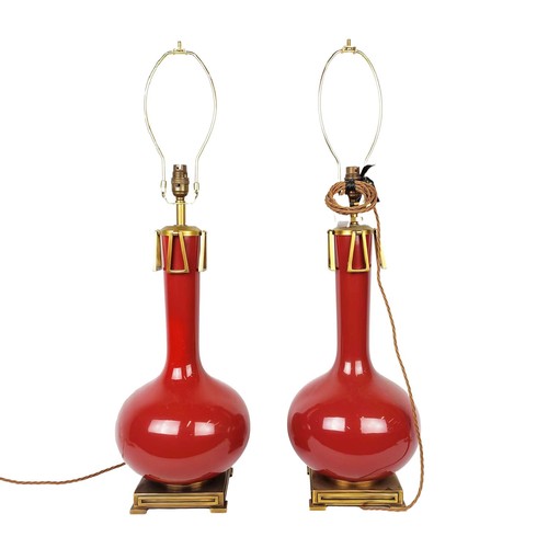 450 - TABLE LAMPS, a near pair, red glazed ceramic and gilt metal, 59cm H at tallest not including shade c... 