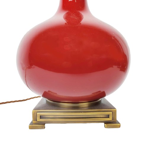 450 - TABLE LAMPS, a near pair, red glazed ceramic and gilt metal, 59cm H at tallest not including shade c... 