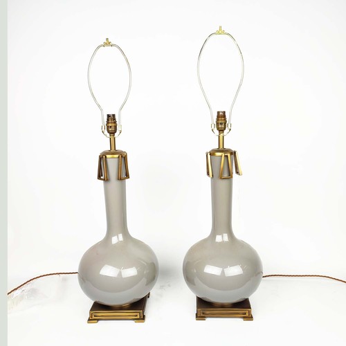 451 - TABLE LAMPS, a near pair, light grey glazed ceramic and gilt metal, 59.5cm H at tallest not includin... 