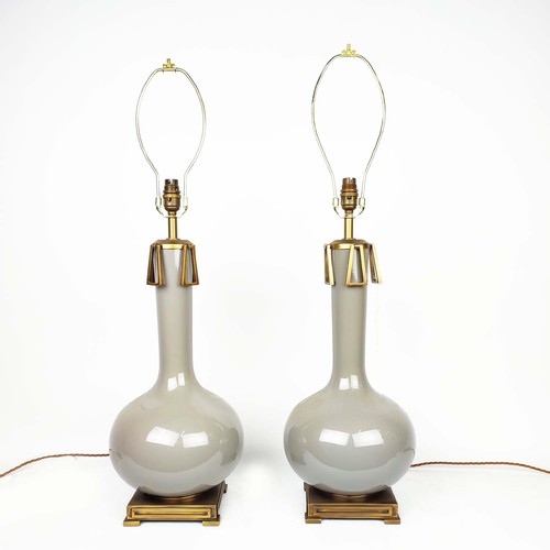 451 - TABLE LAMPS, a near pair, light grey glazed ceramic and gilt metal, 59.5cm H at tallest not includin... 