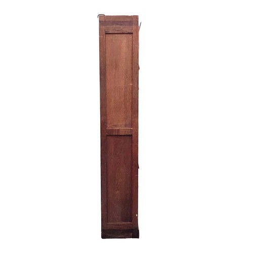 447 - HABERDASHERY CABINET, early 20th century French oak with twenty lift up doors, 213cm H x 95cm W x 38... 