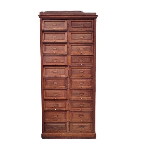 447 - HABERDASHERY CABINET, early 20th century French oak with twenty lift up doors, 213cm H x 95cm W x 38... 