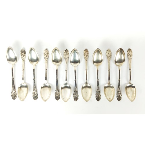 14 - COLLECTION OF DANISH SILVER FLATWARE, by Heimburger, .800 in the Art Nouveau 'mistletoe' pattern twe... 