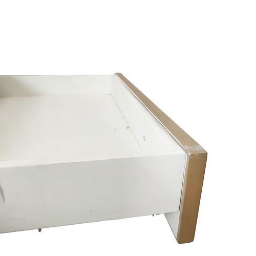 443 - LOW TABLE, faux bronze finish with two drawers, 140cm x 80cm x 46cm.