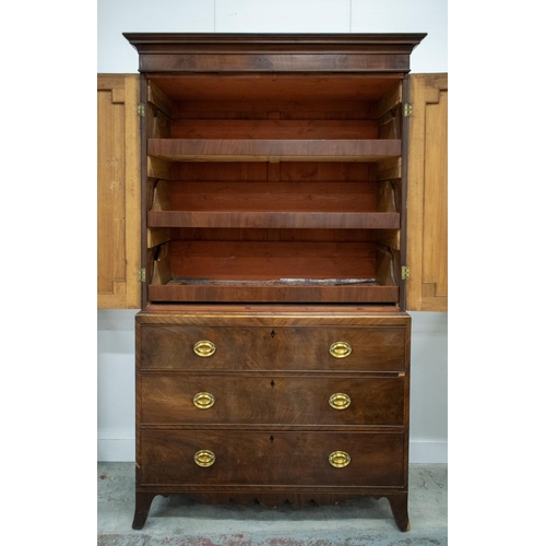 457 - LINEN PRESS, George III mahogany with two doors enclosing sliding trays above a base of three drawer... 