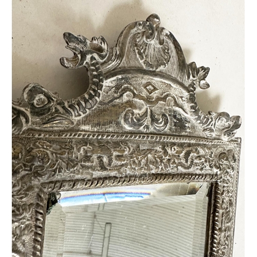 543 - WALL MIRRORS, a pair, early 20th century silvered metal with bevelled plates and lion mask frames, 3... 