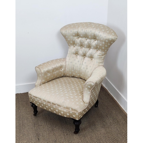 526 - ARMCHAIR, Victorian ebonised and gilt heightened, circa 1870, in patterned cream upholstery, 89cm H ... 