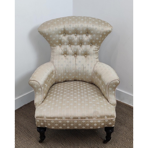 526 - ARMCHAIR, Victorian ebonised and gilt heightened, circa 1870, in patterned cream upholstery, 89cm H ... 